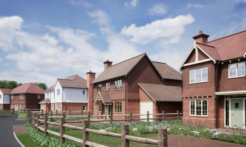 New residential homes with modern architecture in a landscaped setting, featuring electric vehicle charging points and surrounded by greenery, emphasising Downlight Electrical's expertise in home electrical solutions.